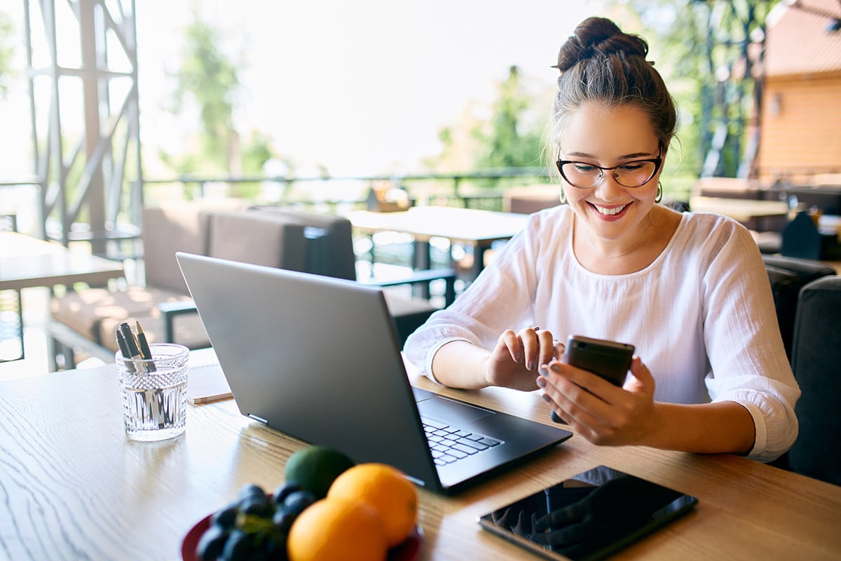 Woman electronically signing a smartphone contract with Docage Signature